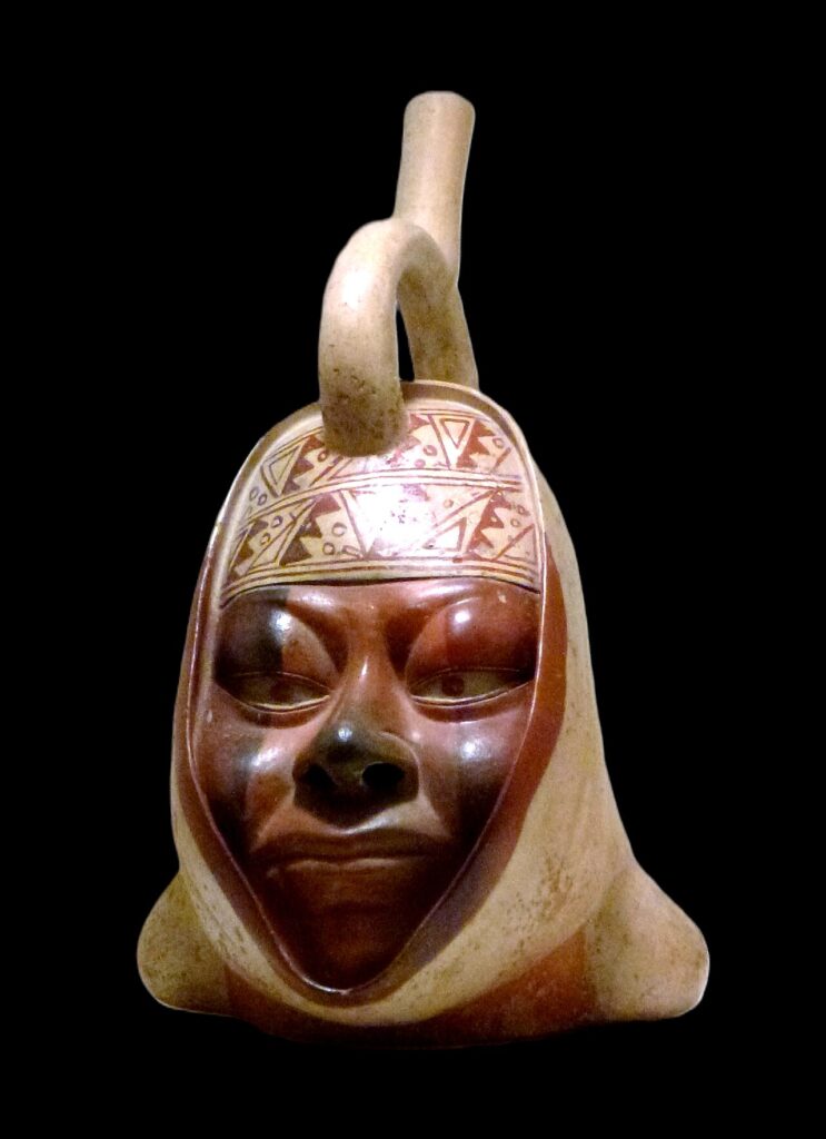 Moche ceramic portrait vessel with a stirrup-shaped spout from the collection of Museo Larco in Lima